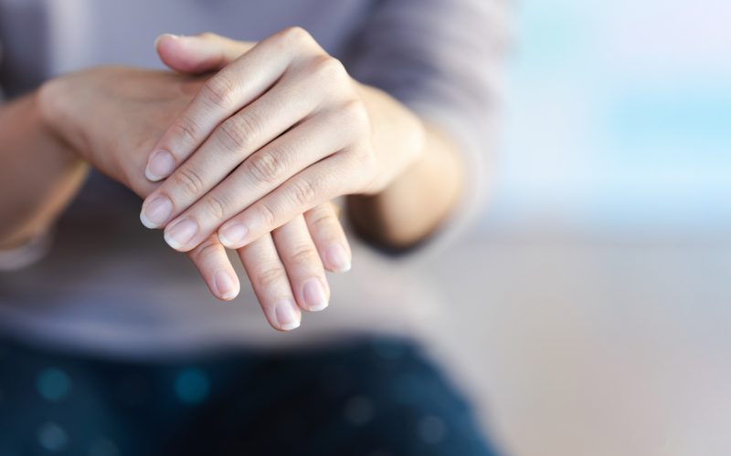Close-up of a woman’s healthy fingernail. Caring for healthy nails. Close-up of a woman's healthy fingernail. Caring for healthy nails.